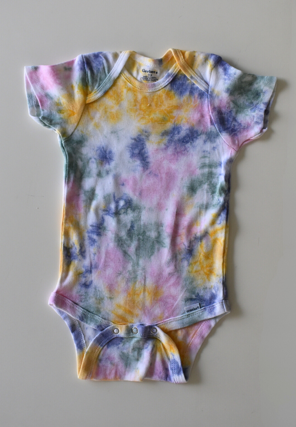 Starbust Baby Onesie - Burst of Colors