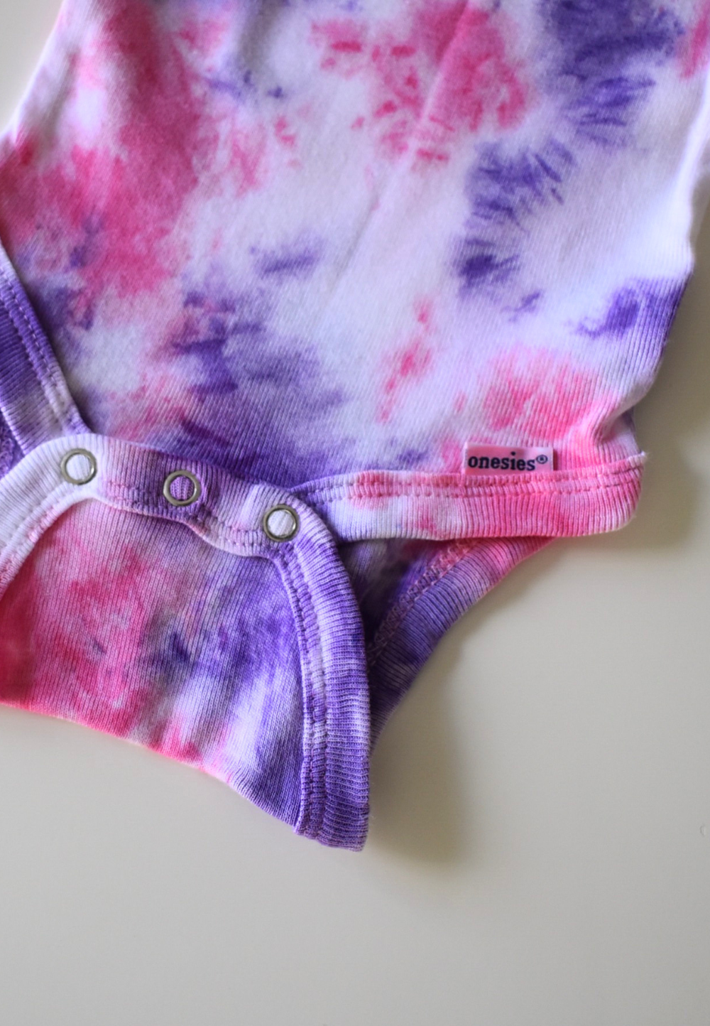 Starbust Baby Onesie - Purple & Pink