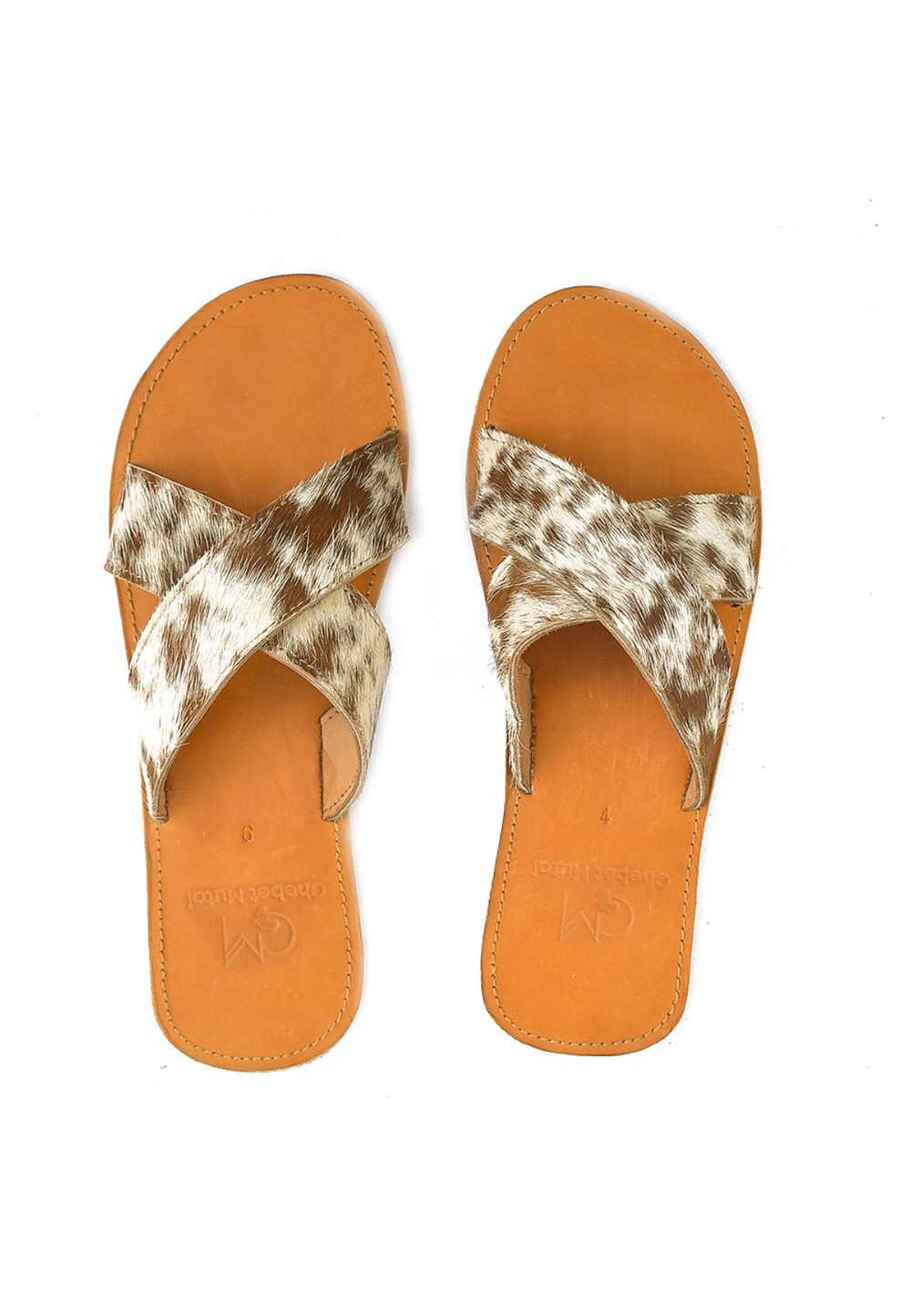 Tan hair on leather sandals
